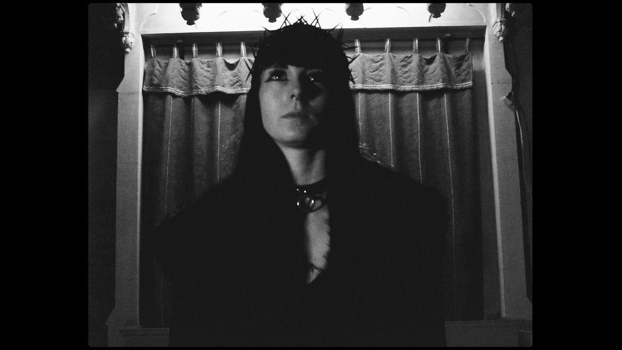 Osculum Infame: The Shameful Kiss backdrop