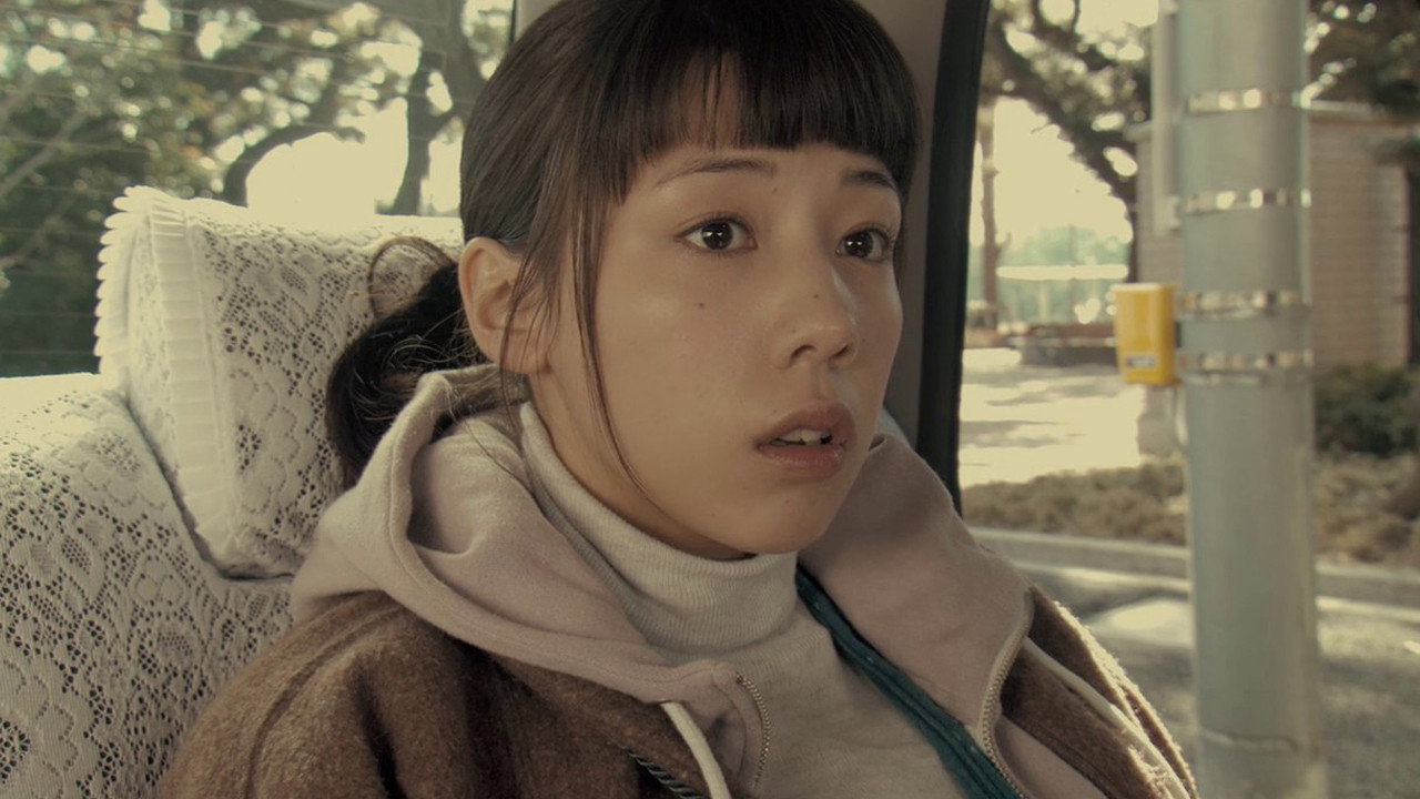 Mitsuko Delivers backdrop