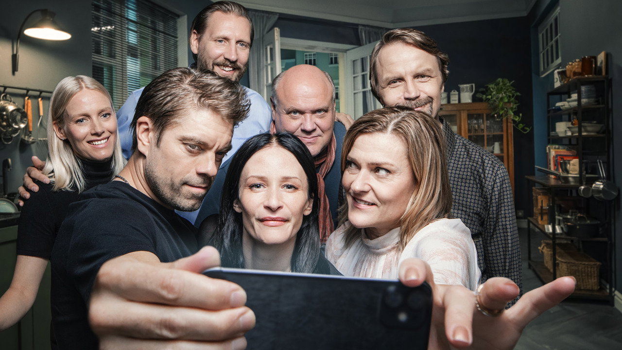 Täydelliset vieraat backdrop