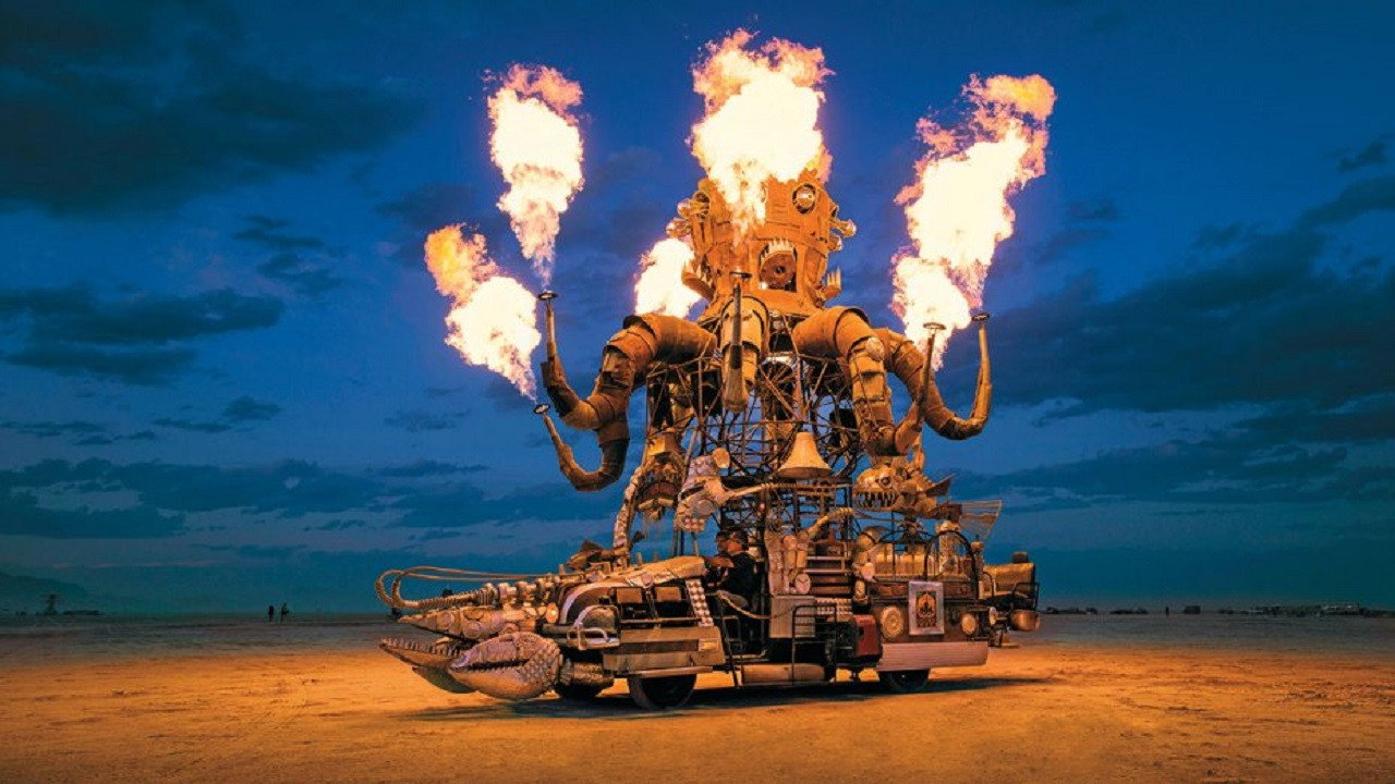 Journey to the Flames: 10 Years of Burning Man backdrop