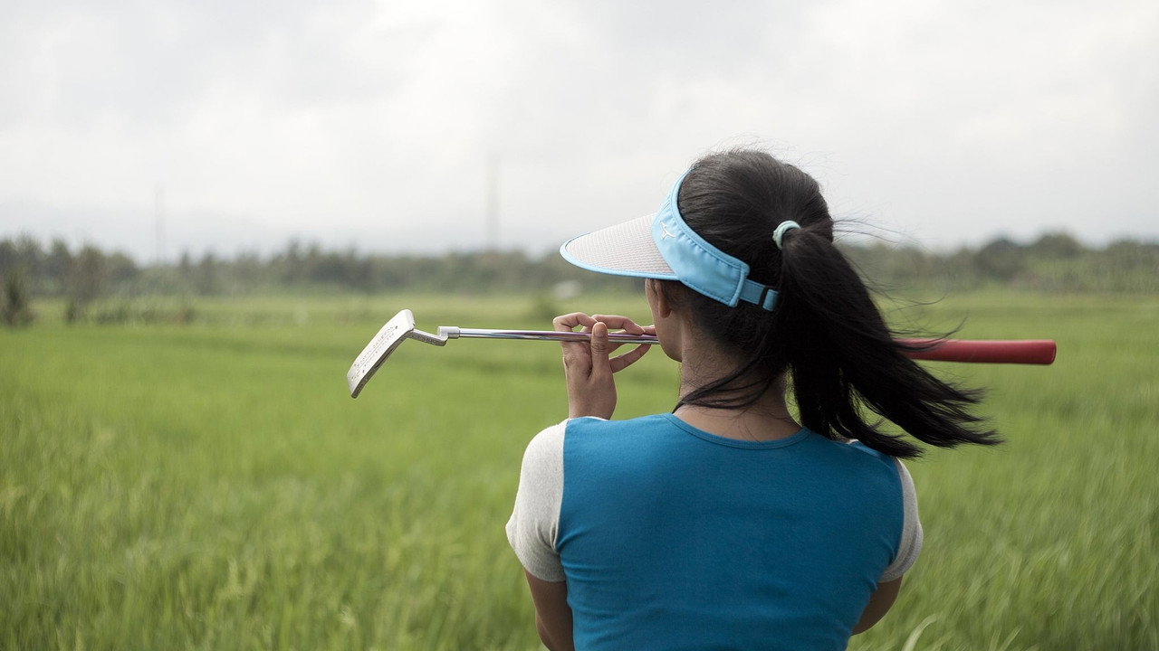 A Lady Caddy Who Never Saw a Hole in One backdrop