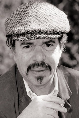 Ticky Holgado portrait