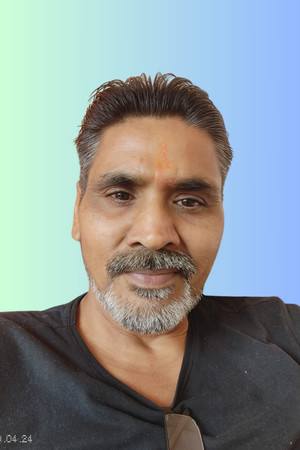 KD Sandhu portrait