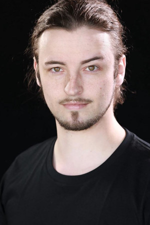 Travis Holian portrait