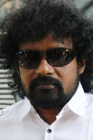 Mu Kalanjiyam portrait