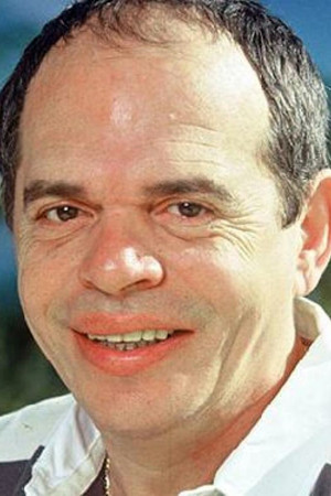 Ticky Holgado portrait