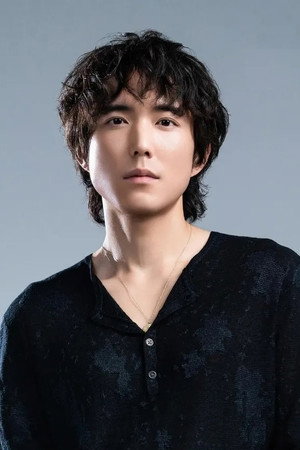 Justin H. Min portrait