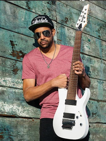 Tony MacAlpine and band perform "Tears of Sahara" on EMGtv movie poster