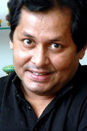 Kharaj Mukherjee portrait